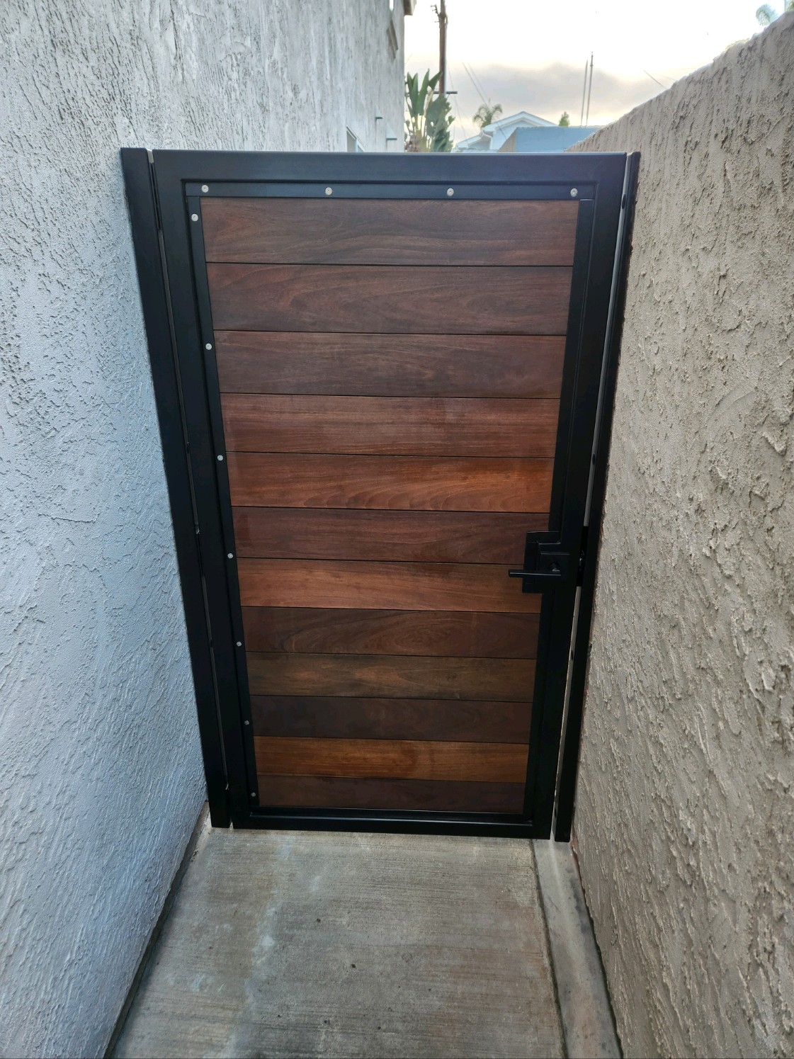 Stair remodel with metal rail